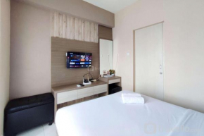 Comfortable and Modern 1BR without Living Room at Amartha View Apartment By Travelio